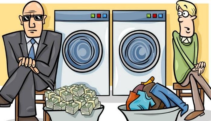 A cartoon of two people in front of washing machines.